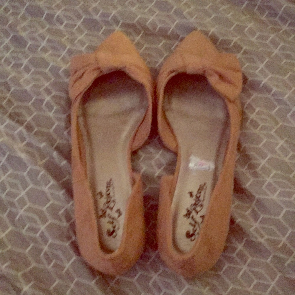 Tan flats with slight heel